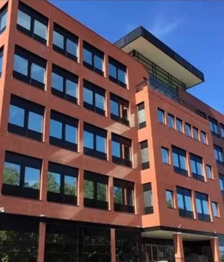 Exterior view of a multi-storey office building in Fredericton.