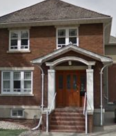Front entrance of a house-style clinic building in Regina.